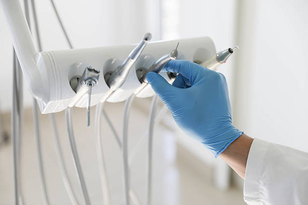 Professional Root Canal Treatment technician working in Turnersville, NJ